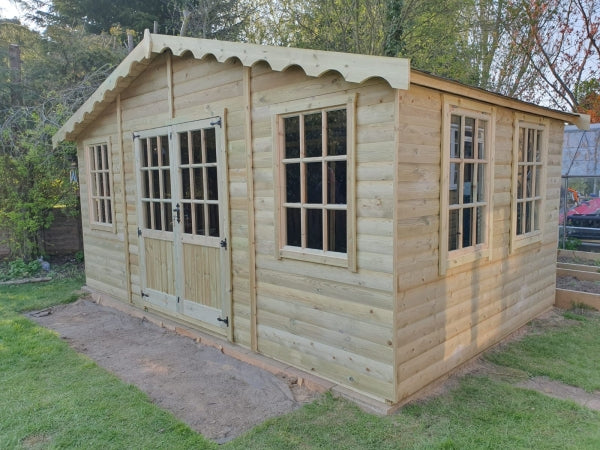 Loglap Cladding On Building 22x125 Tanalised Loglap Timber Cladding | Loglap Cladding